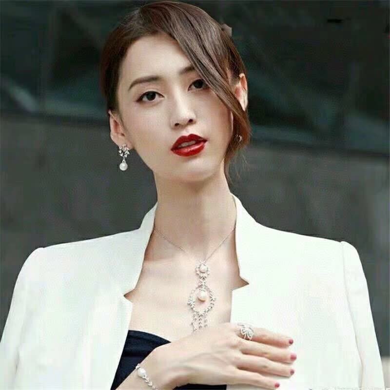 APM Monaco Silver Leaf Pearl Earrings